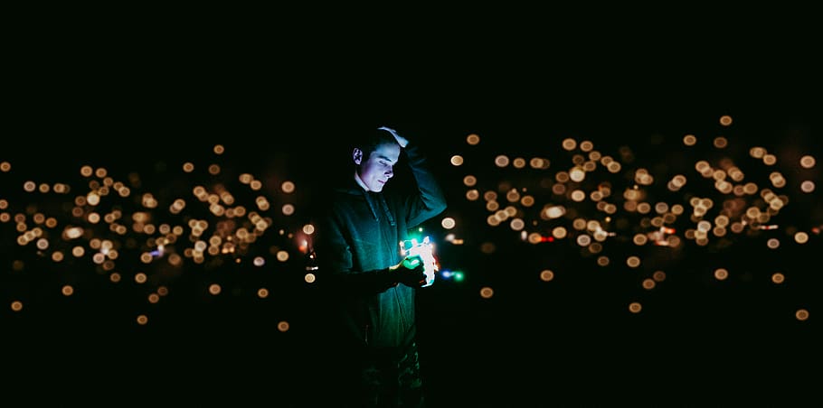 man holding green light, night, illuminated, one person, young adult HD wallpaper