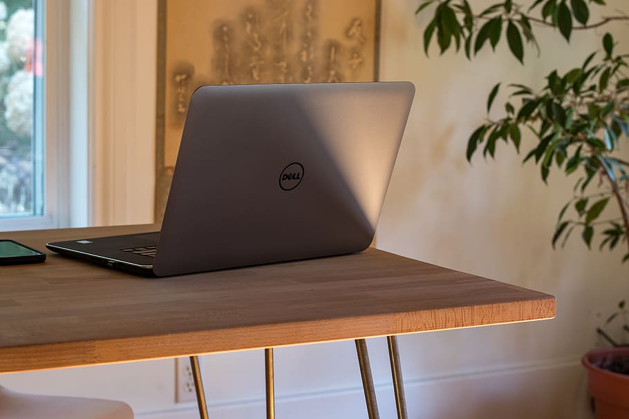 gray Dell laptop on table, wireless technology, indoors, communication