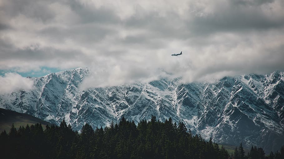 plane flying above forest, mountain, outdoors, nature, mountain range, HD wallpaper