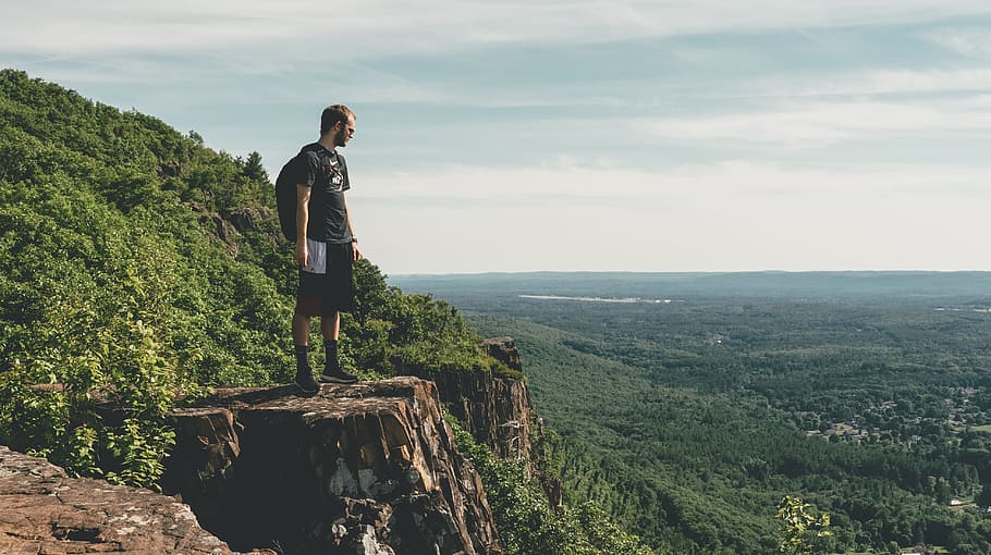 Man Standing On The Cliff, adventure, cliffside, daylight, exploration HD wallpaper