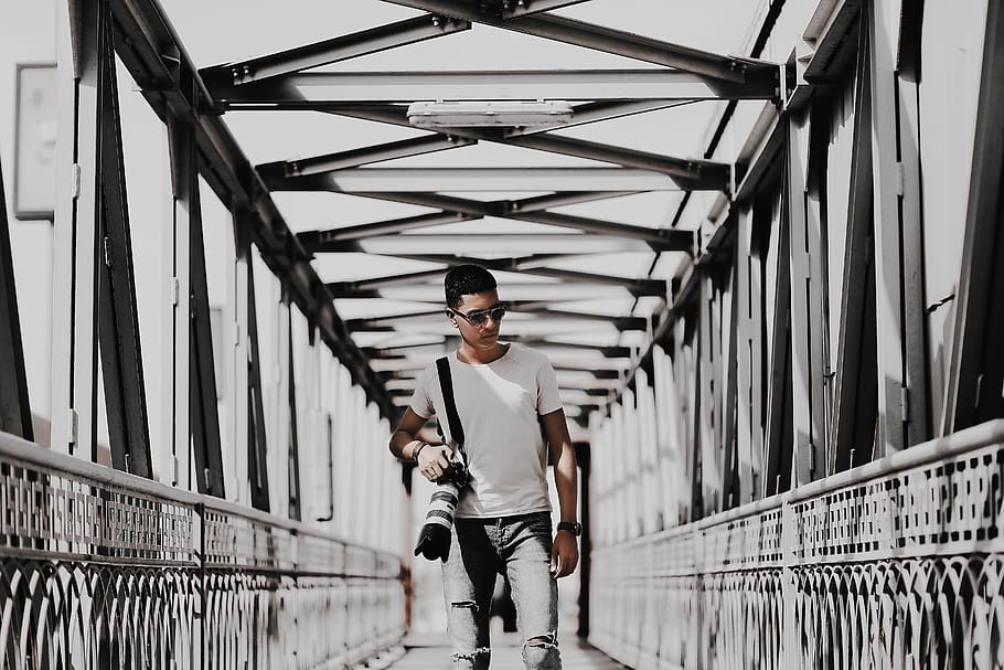 Man Standing On Bridge, architecture, camera, camera lens, person HD wallpaper
