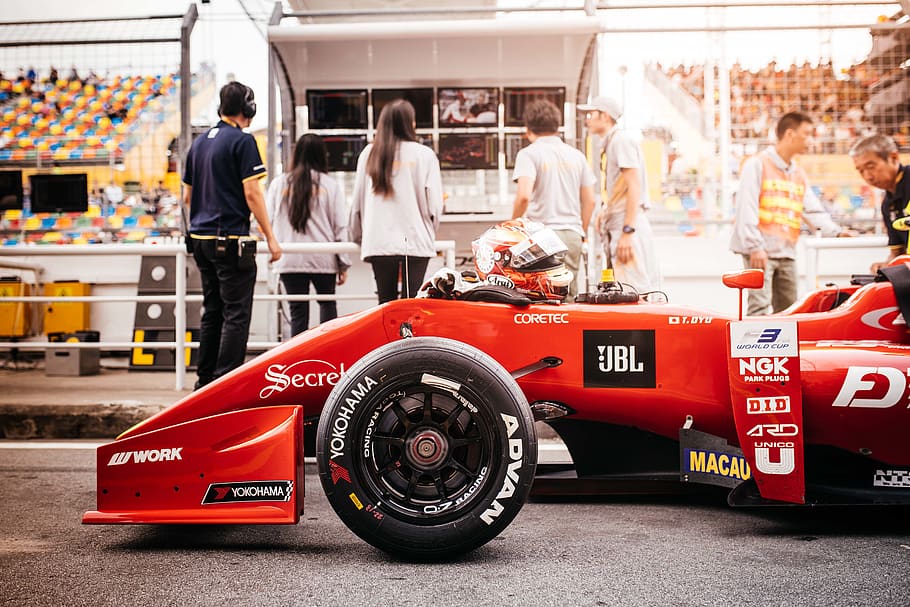 red racing car, human, person, race car, machine, wheel, vehicle HD wallpaper