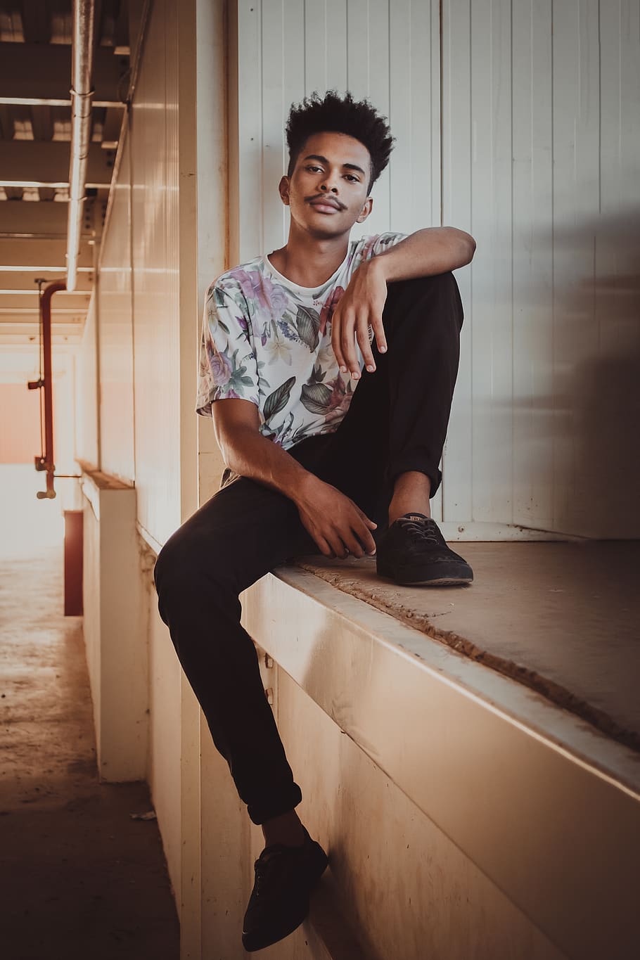 man sitting on concrete surface, clothing, apparel, footwear HD wallpaper