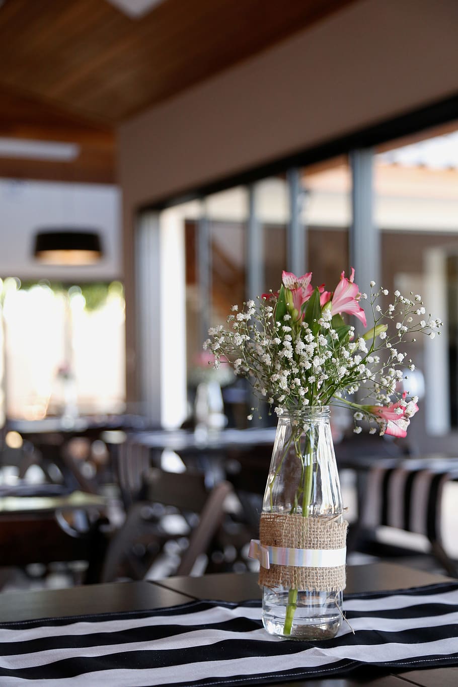 Pink and White Flowers on Clear Glass Vase, blurred background HD wallpaper
