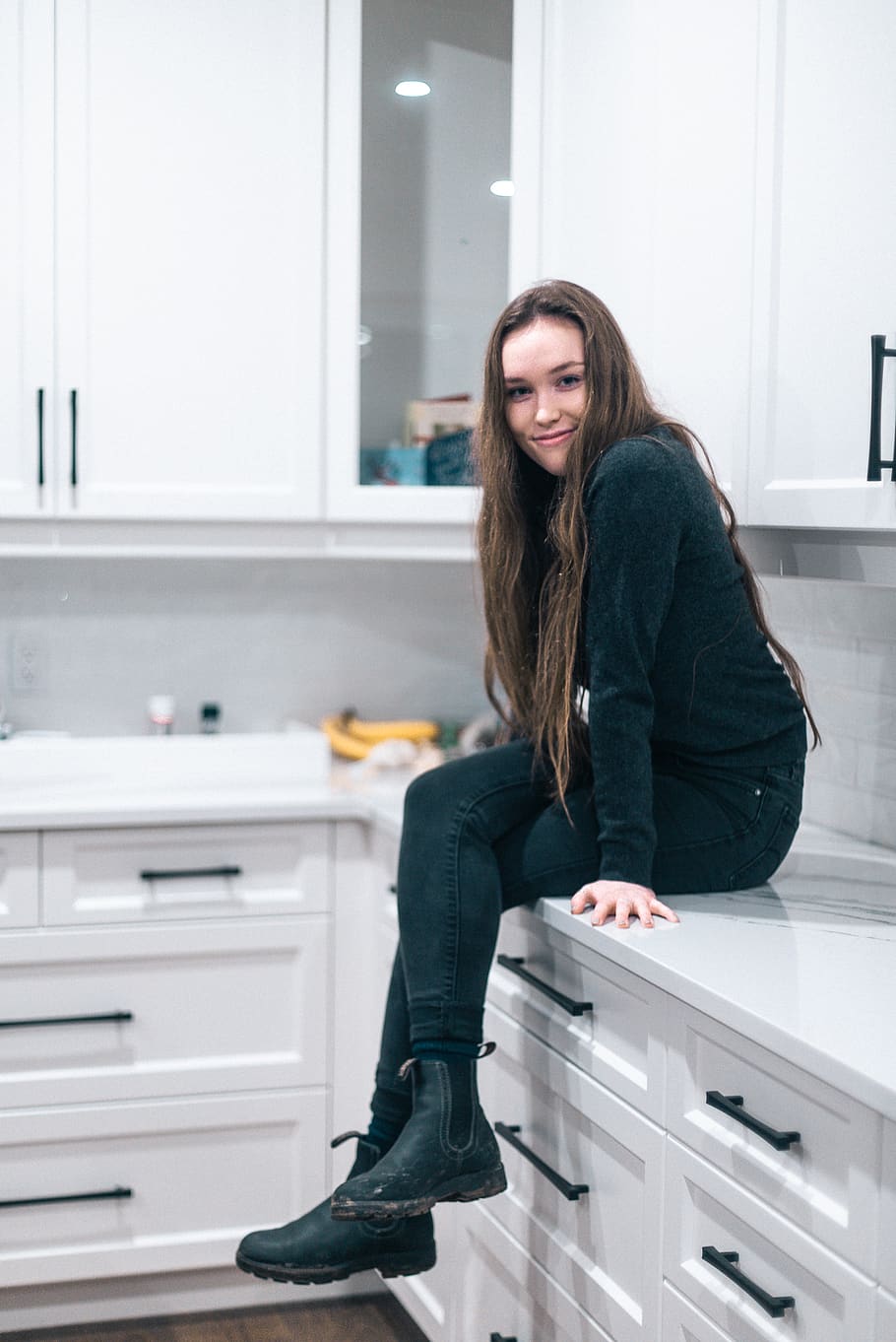 Photo of Woman Sitting on Top of Drawers, attractive, beautiful