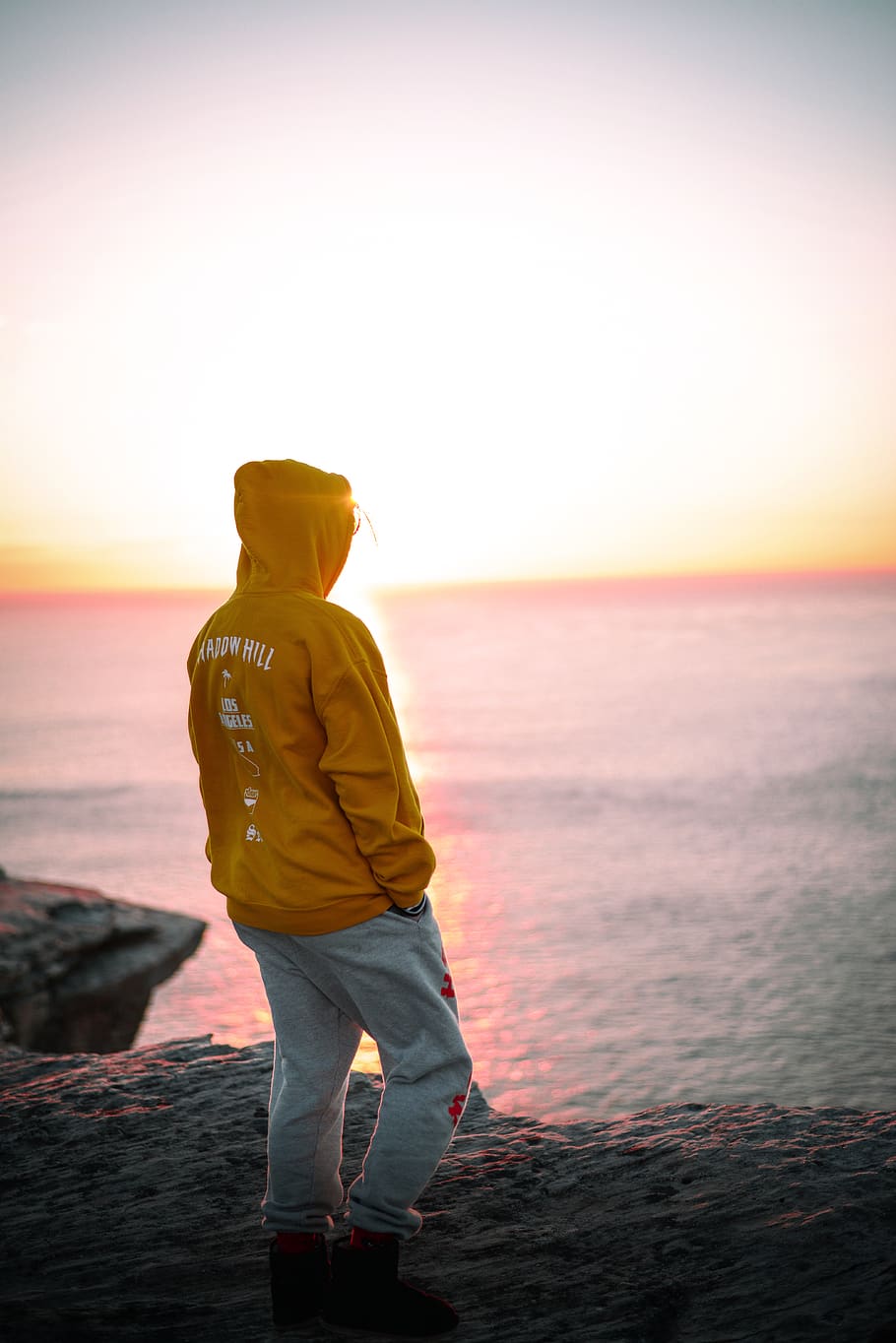 man wearing brown pullover hoodie, clothing, apparel, human, person HD wallpaper
