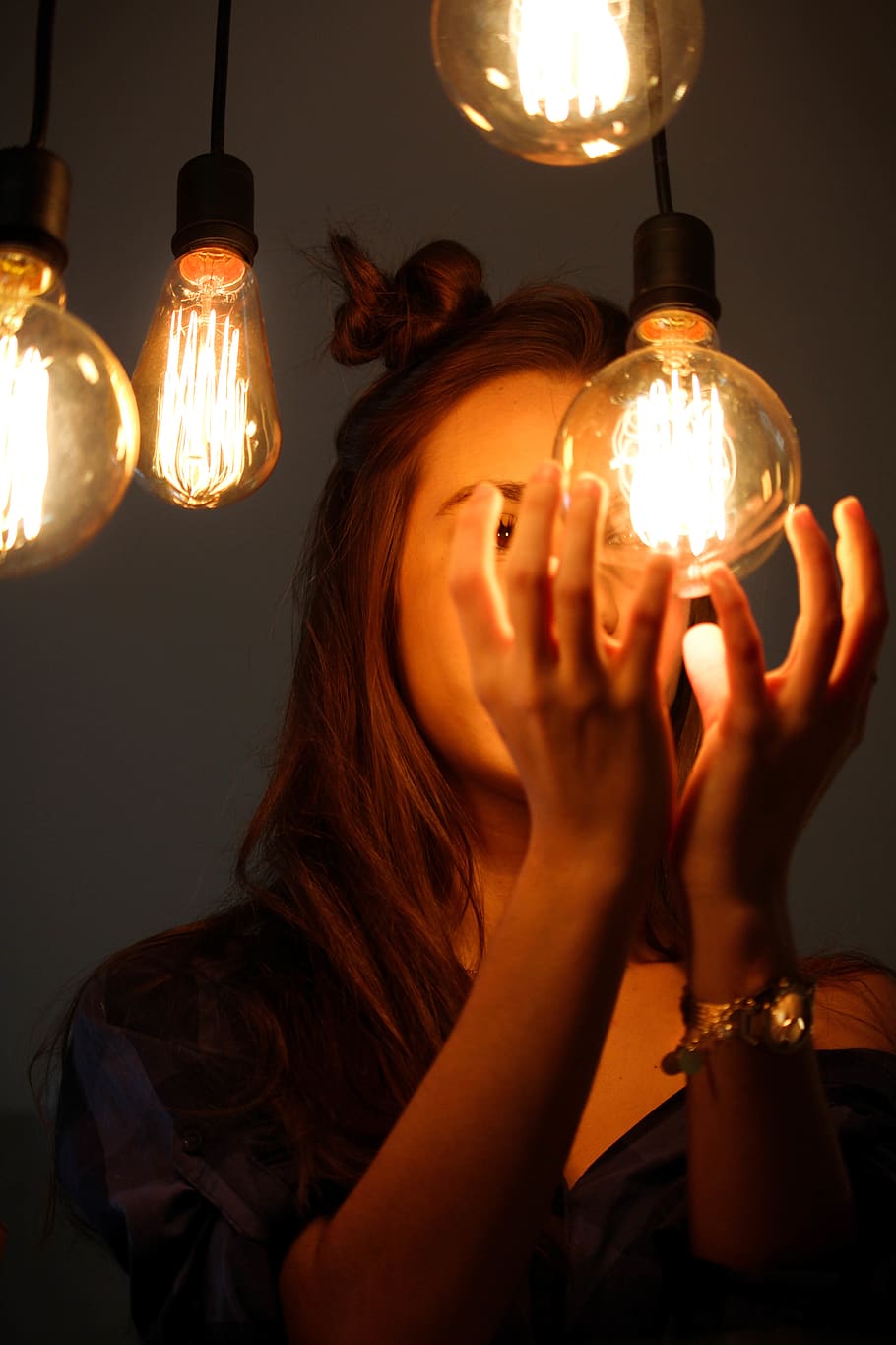Woman About to Hold Edison Light Bulb, bright, close-up, design HD wallpaper