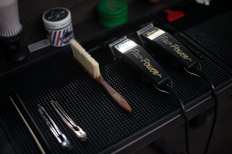 Tow Black Hair Clippers, barbershop, brush, close-up, display