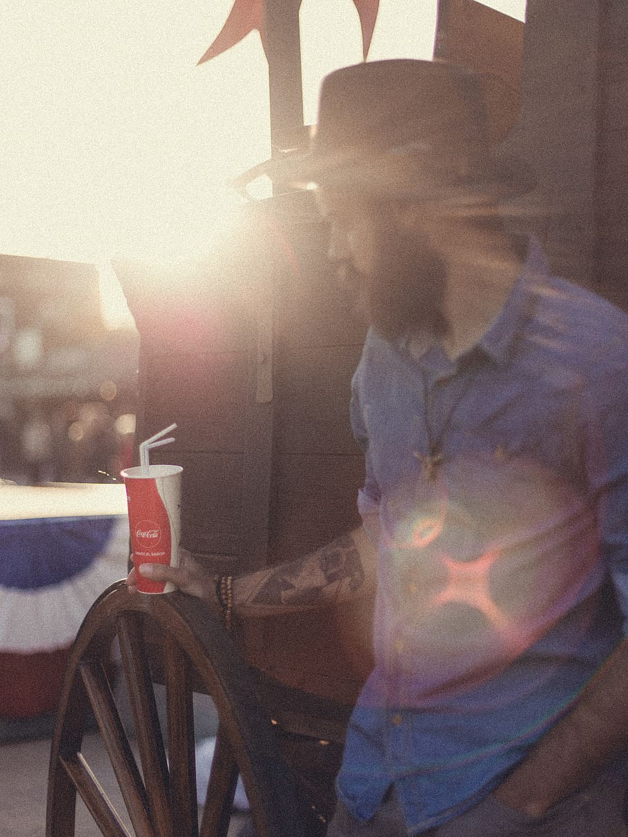 man wearing hat, person, human, flare, light, beverage, drink HD wallpaper