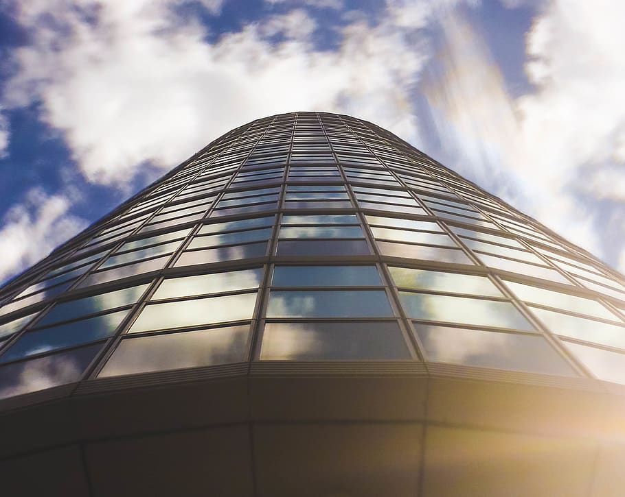 building, sunset, reflection, windows, sky, blue, orange, yellow HD wallpaper