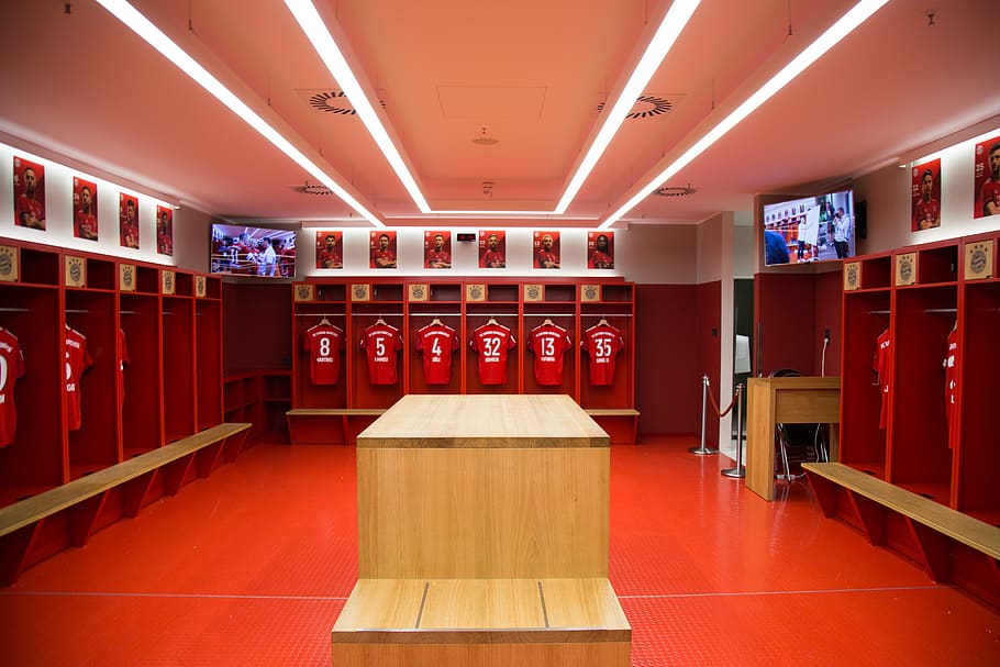 red wooden players locker, indoors, room, dressing room, furniture