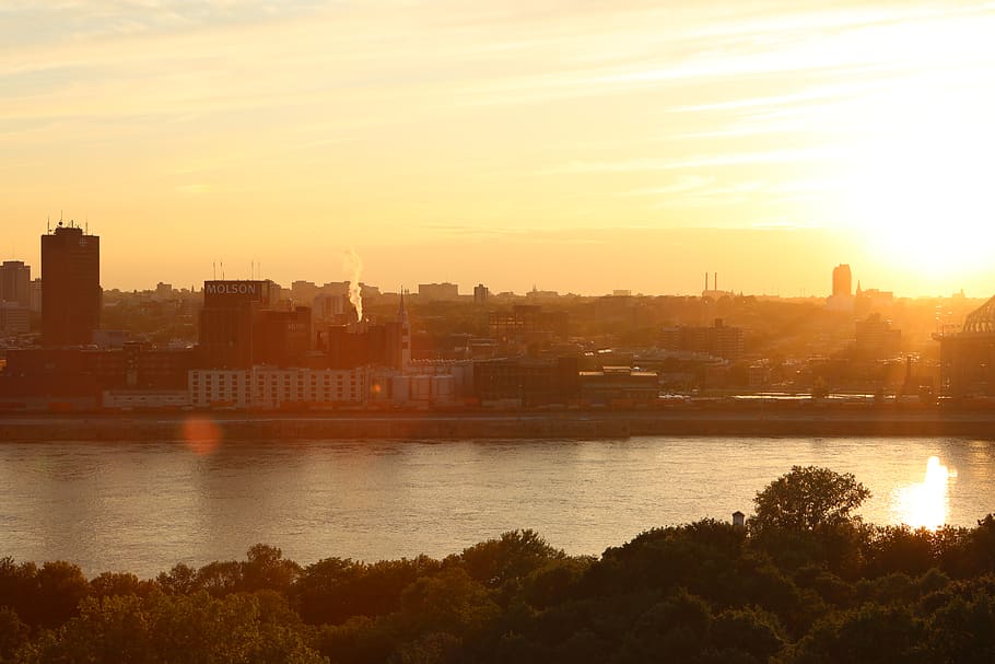 sunset, sky, water, river, buildings, trees, view, skyline HD wallpaper