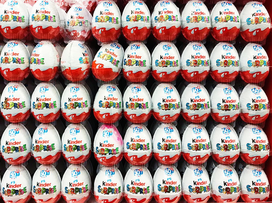 white and red chocolate eggs, side by side, large group of objects HD wallpaper