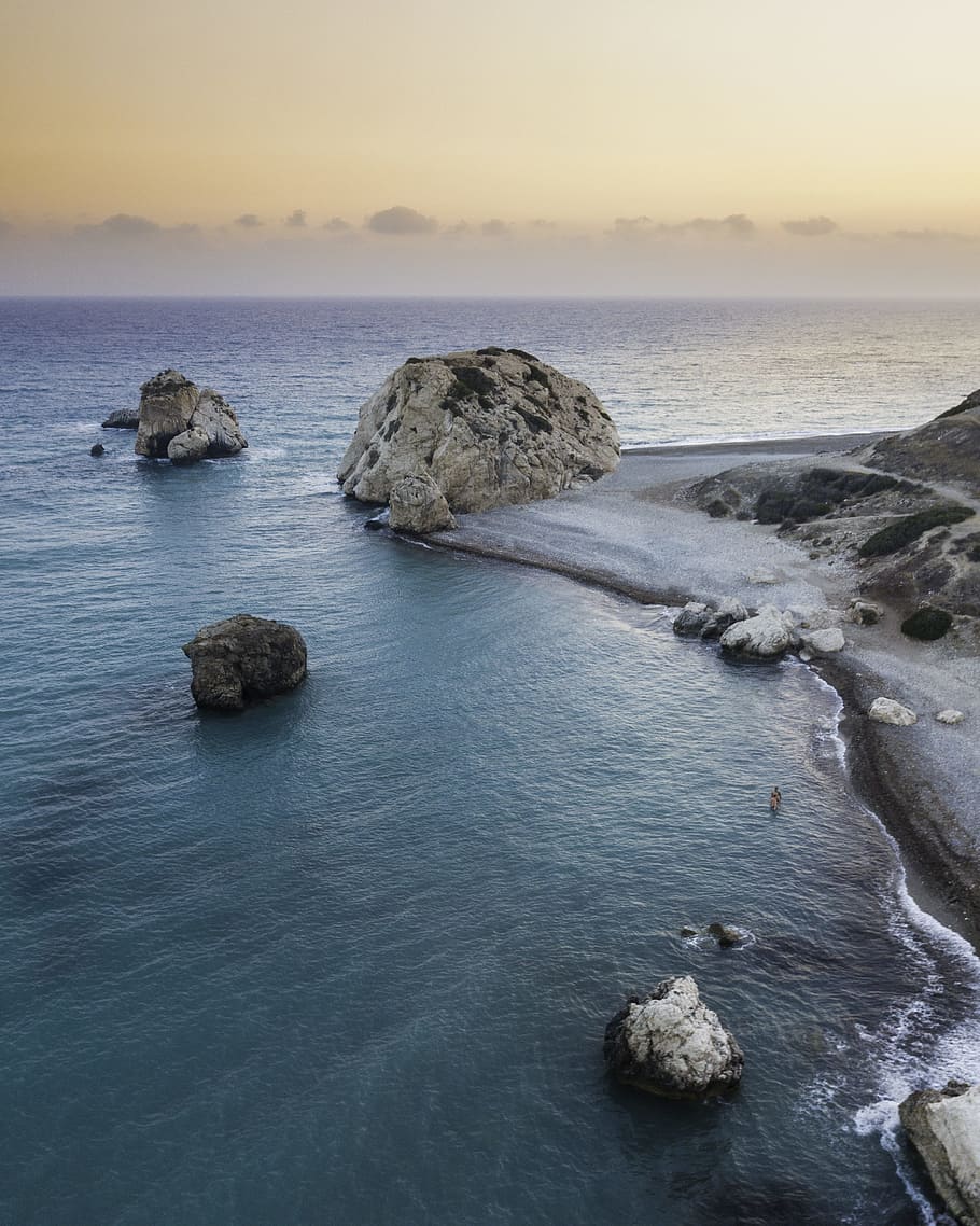 aerial photography of seashore beside body of water, coast, cloudy HD wallpaper