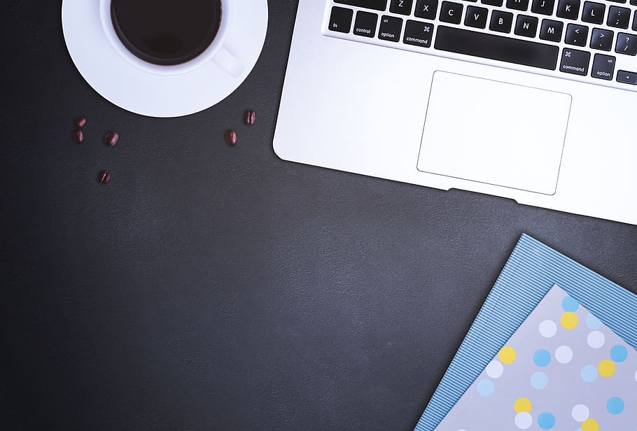 Black work desk with a laptop, coffee and block, computer, wireless technology HD wallpaper