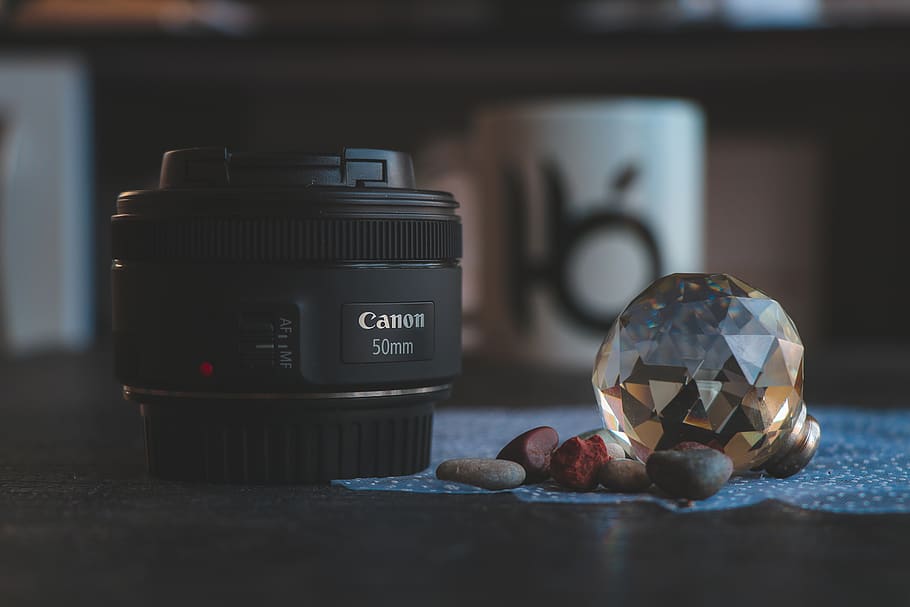 Close-Up Photography of Camera Lens Near Gem, 50mm, blur, brand
