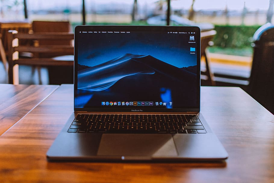 MacBook Pro on brown wooden surface, pc, computer, electronics, HD wallpaper
