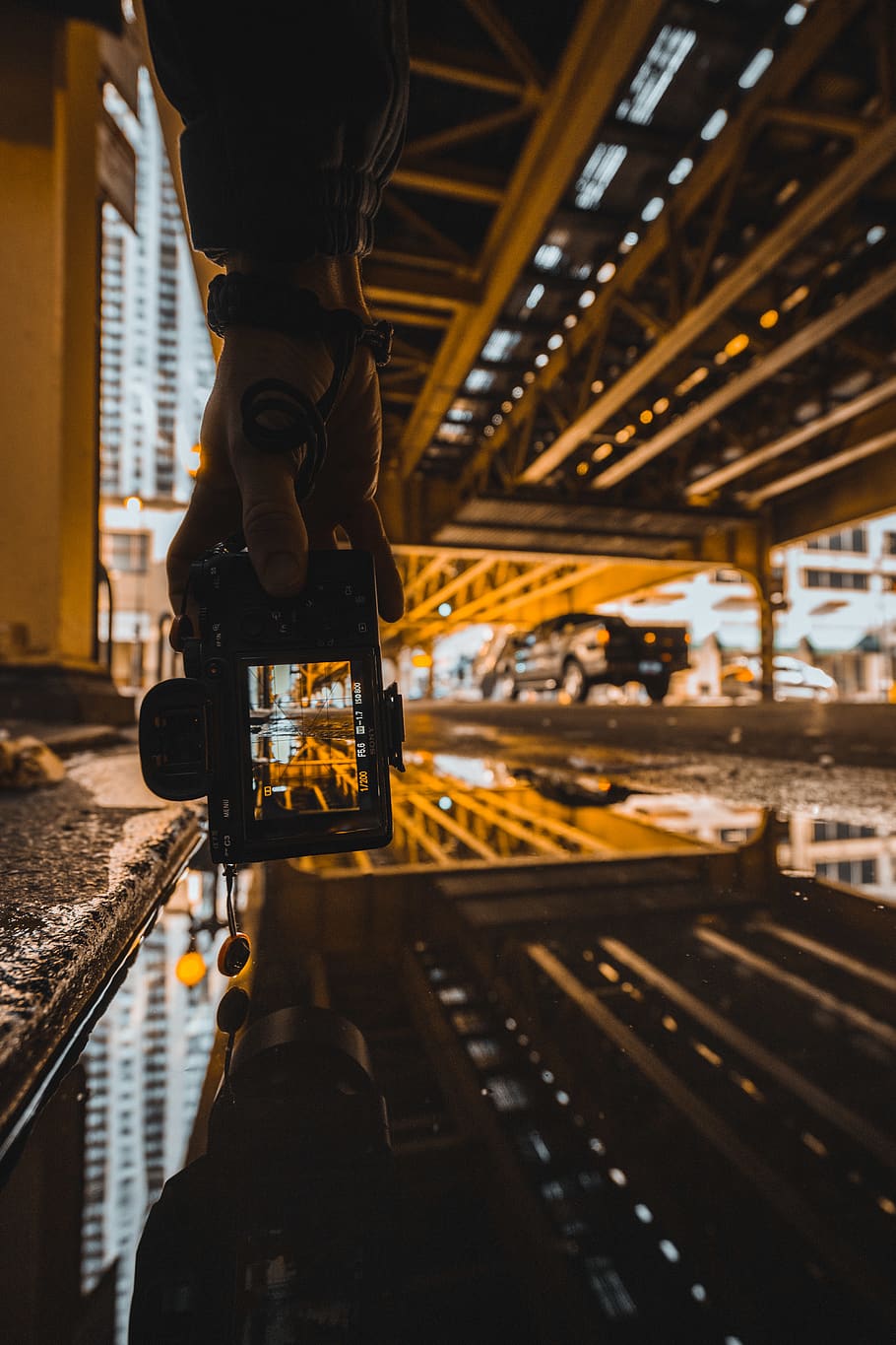 Person Holding A Camera , puddle, reflection, road, taking photo HD wallpaper