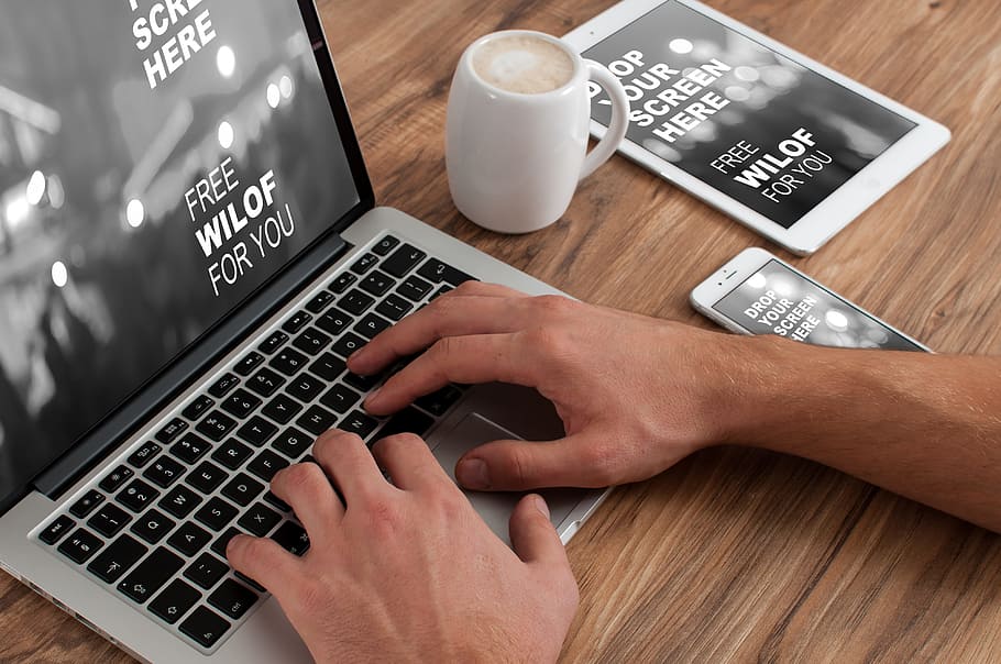 Human Hand on Apple Macbook, gadgets, hands, ipad, iphone, laptop HD wallpaper