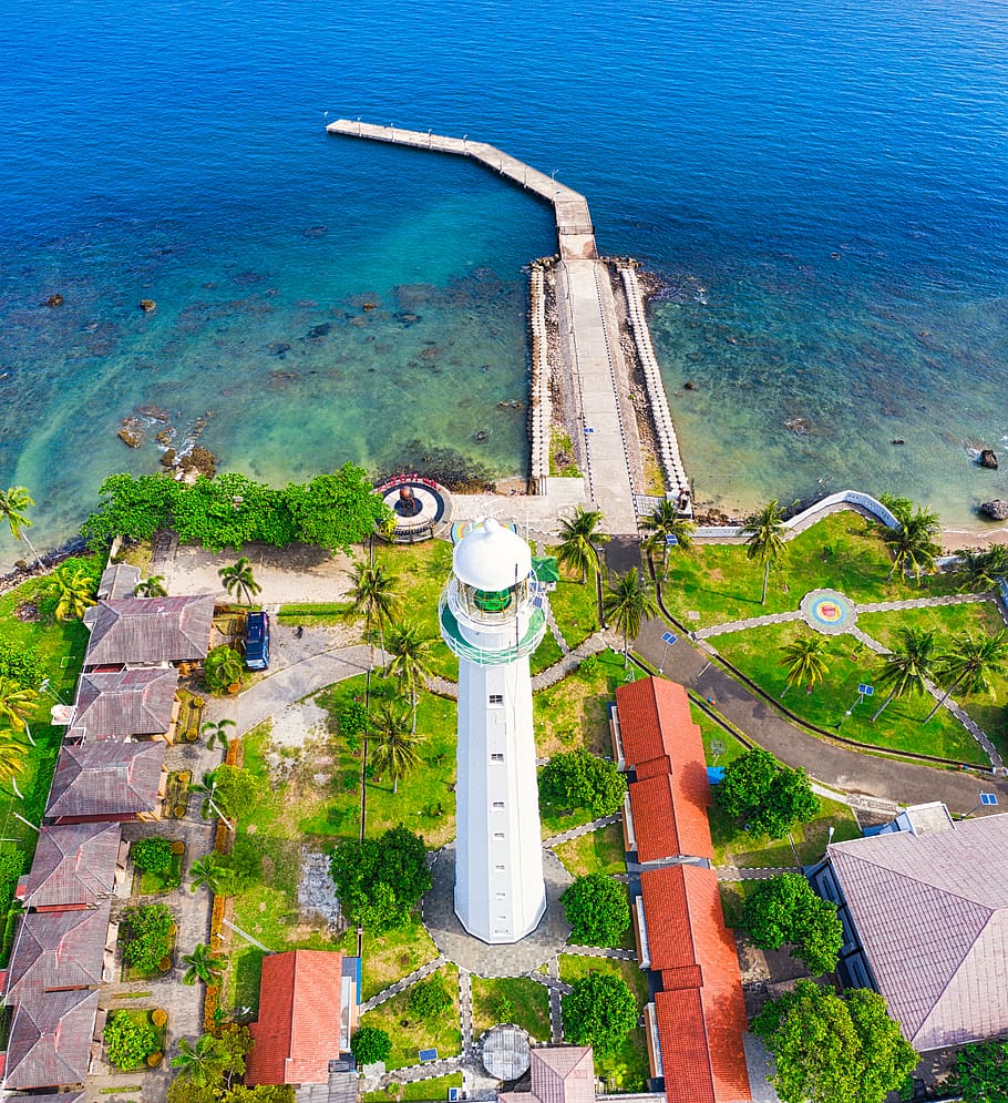 White Lighthouse Near Body of Water, aerial photography, aerial shot