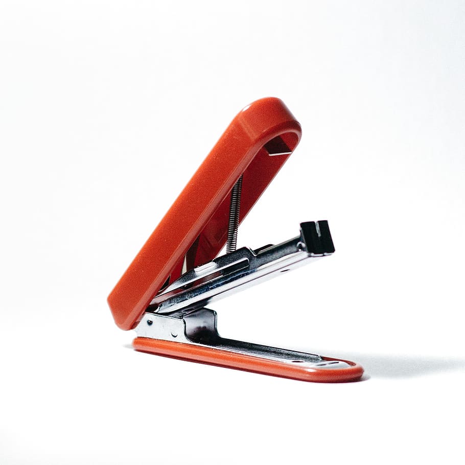 orange stapler opened, studio shot, white background, still life HD wallpaper