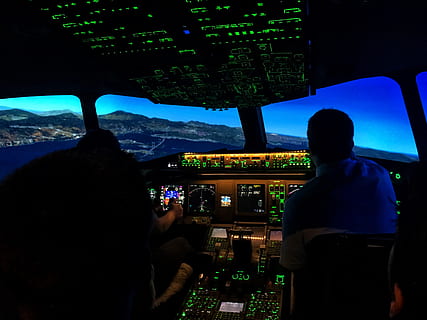 two men sitting on aircraft control panel, cockpit, human, person HD wallpaper