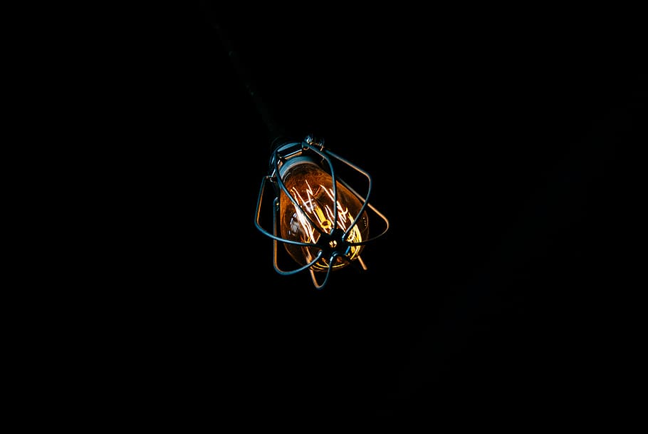 lighted light bulb, copy space, black background, studio shot HD wallpaper