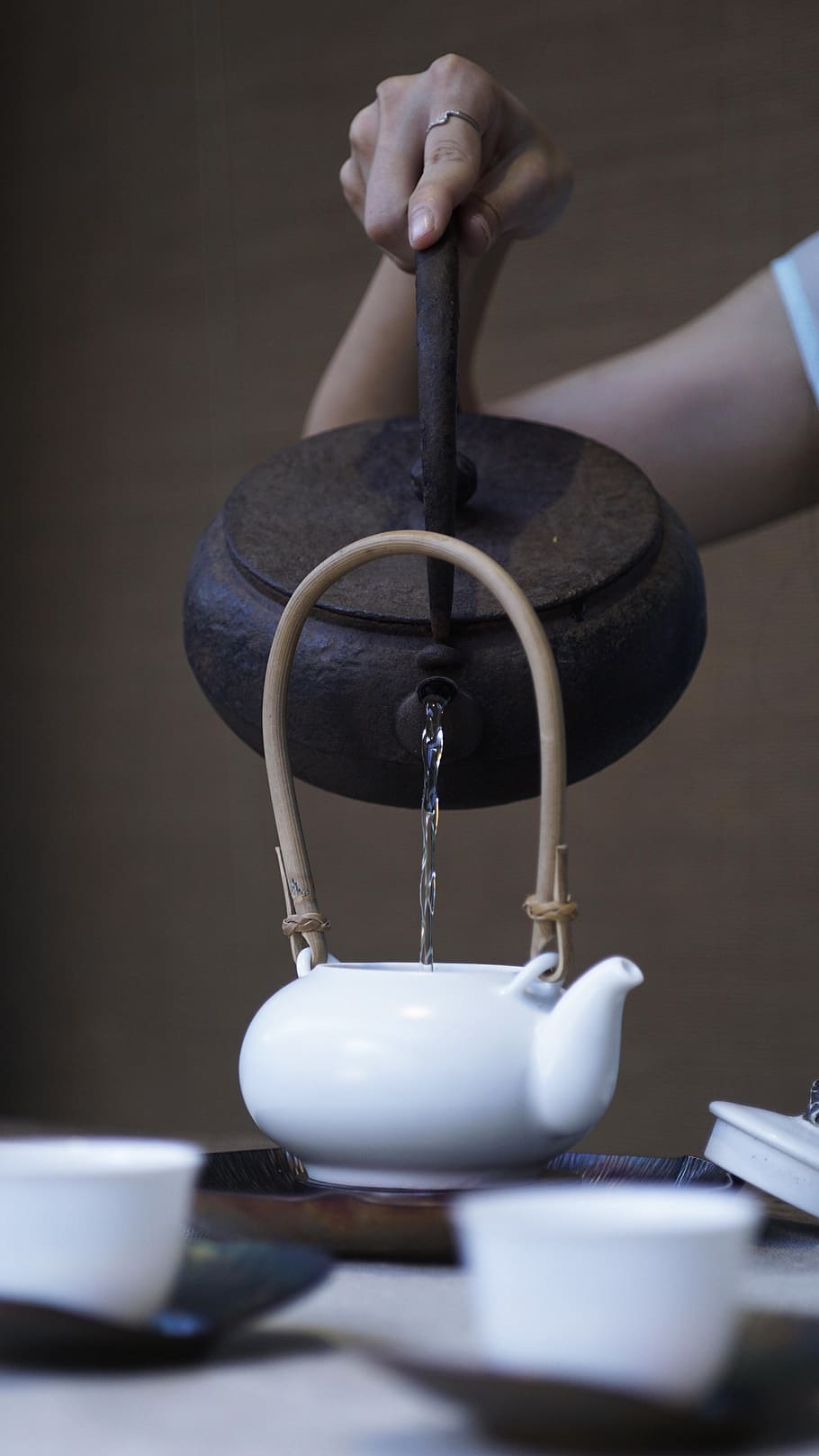 person pouring water on ceramic teapot, cup, china, guangzhou, HD wallpaper