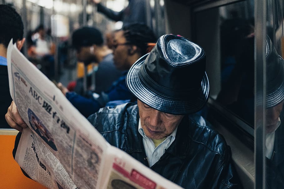 Stay Informed, man, newspaper, hat, person, subway, street photography HD wallpaper