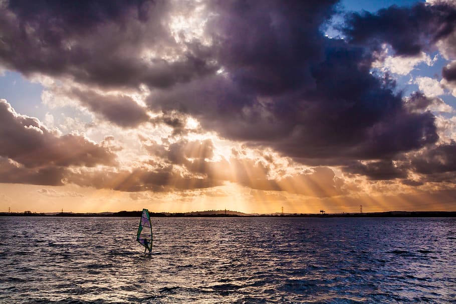crepuscular rays, water, sky, sea, cloud - sky, sunset, one person HD wallpaper