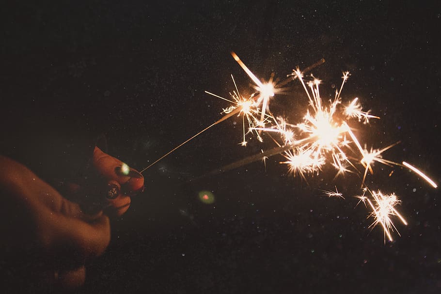 spark, burning, holding, hand, human hand, one person, motion HD wallpaper