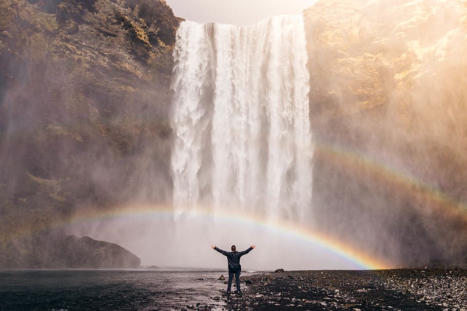 person in front of waterfalls with double rainbow during daytime, HD wallpaper