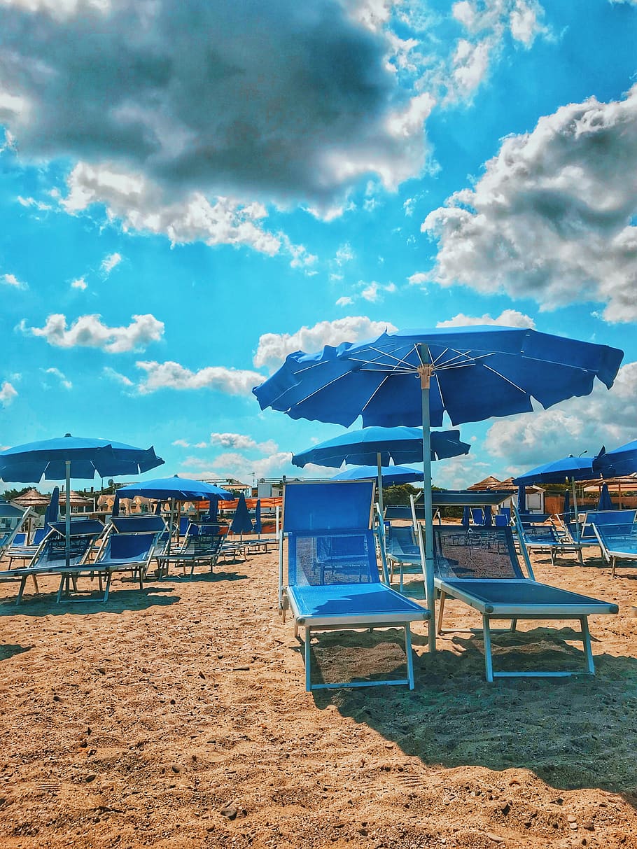 Blue Parasols And Sun Loungers On Sand, beach, chairs, clouds HD wallpaper