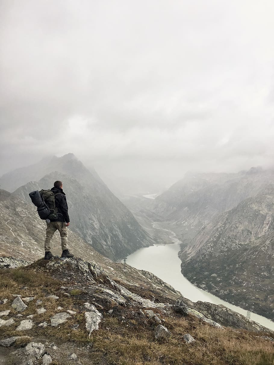 man standing on rock boulder, mountain, leisure activity, scenics - nature HD wallpaper