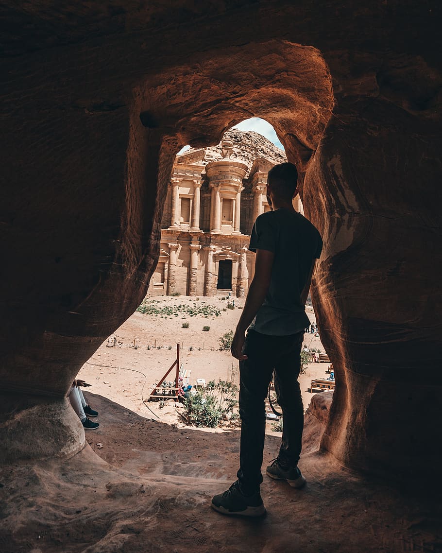 man standing inside cave, person, human, housing, building, monastery HD wallpaper