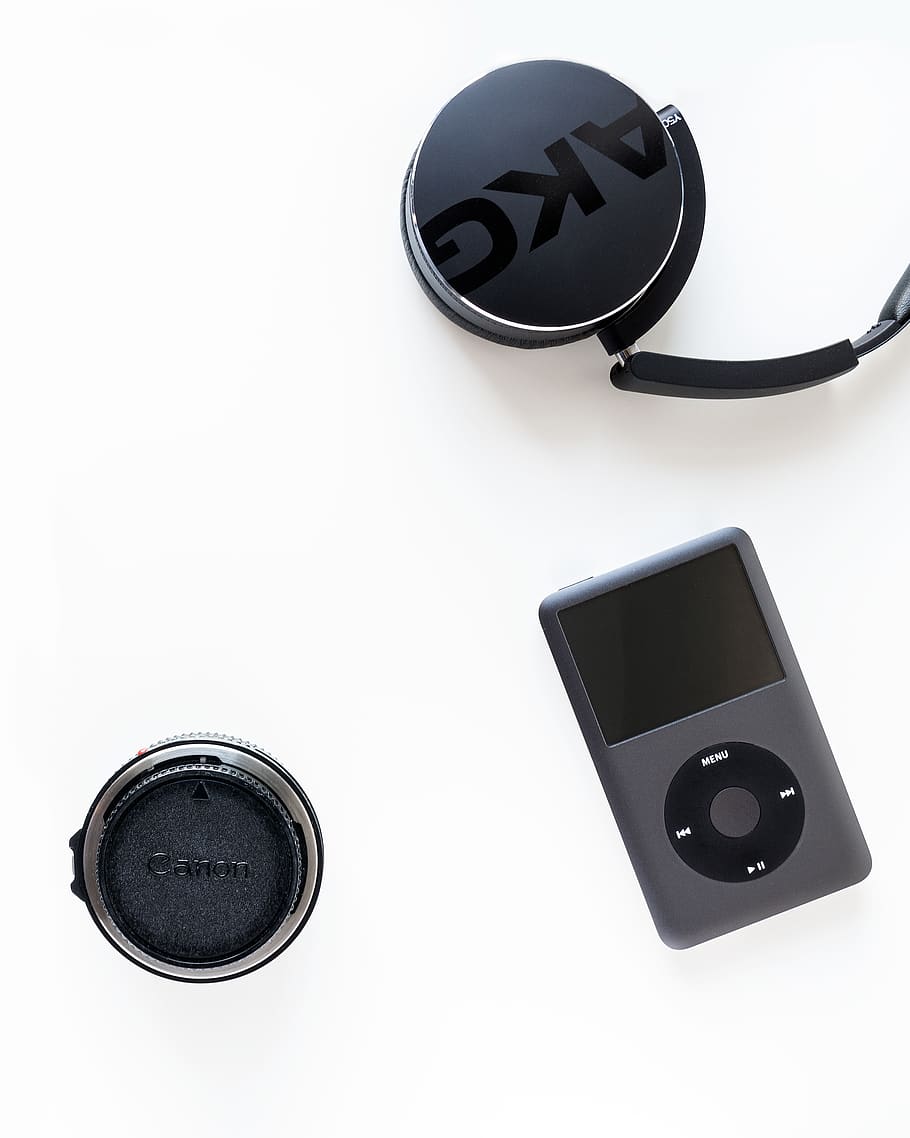 black iPod classic beside black Canon camera lens, lens cap, electronics, HD wallpaper