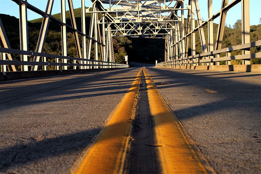 road, bridge, center, lines, sunset, journey, street, yellow HD wallpaper