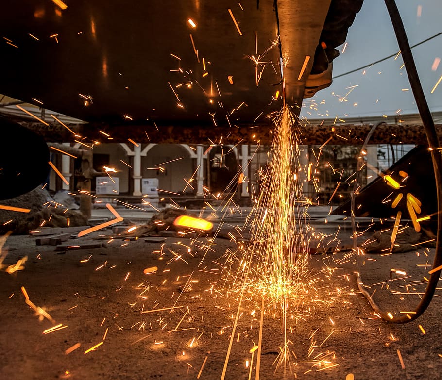 Welding Sparks, grinder, illuminated, motion, glowing, burning HD wallpaper