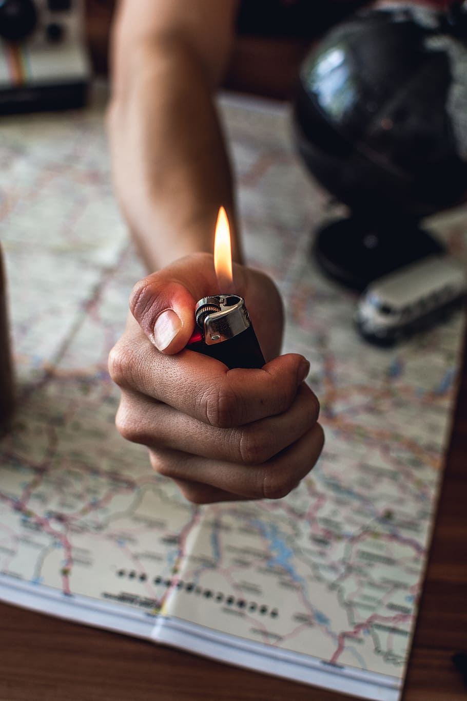 Person Holding Black Disposable Lighter, flame, hand, human hand HD wallpaper