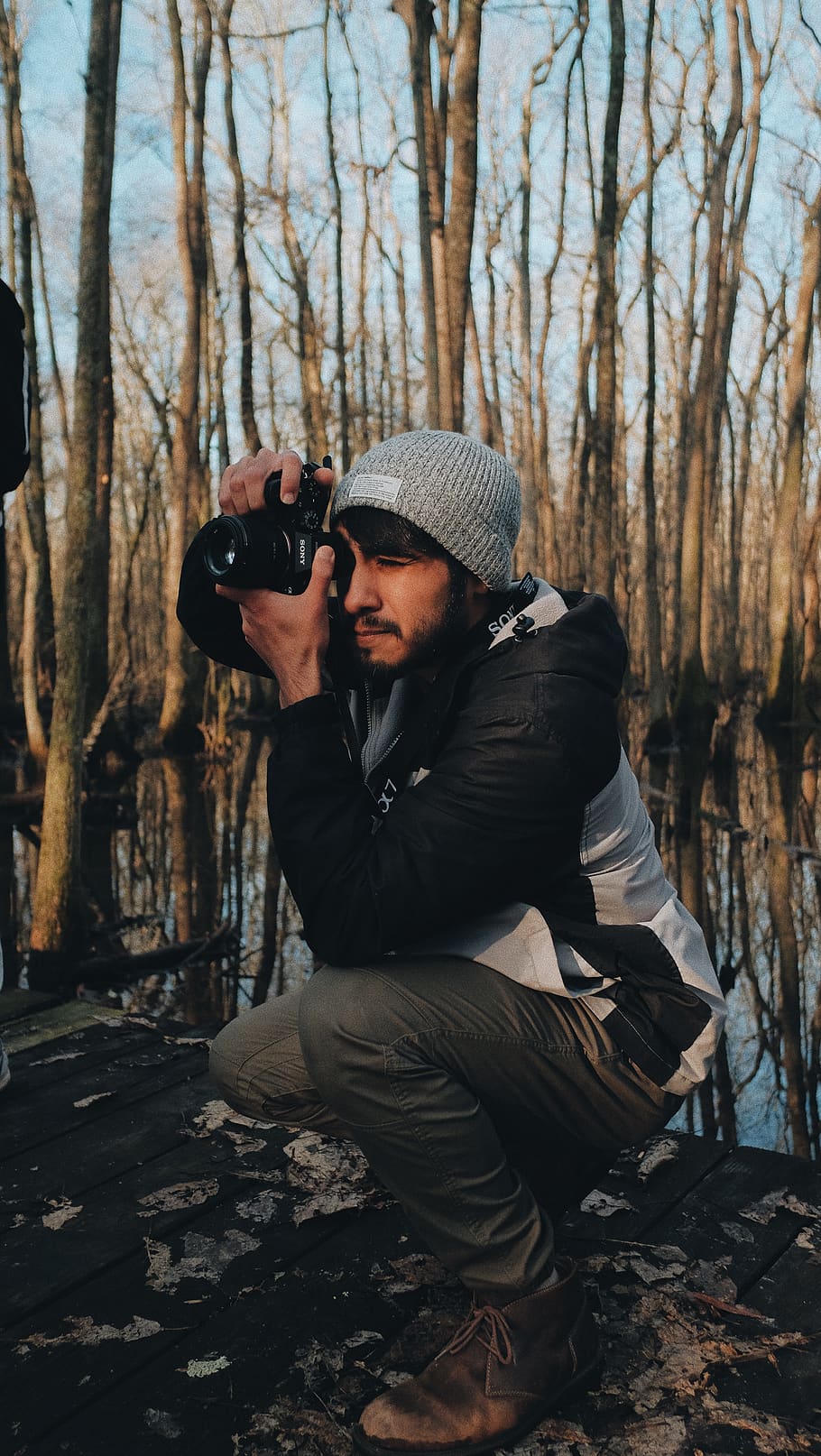 man holding camera, human, person, outdoors, nature, land, water HD wallpaper