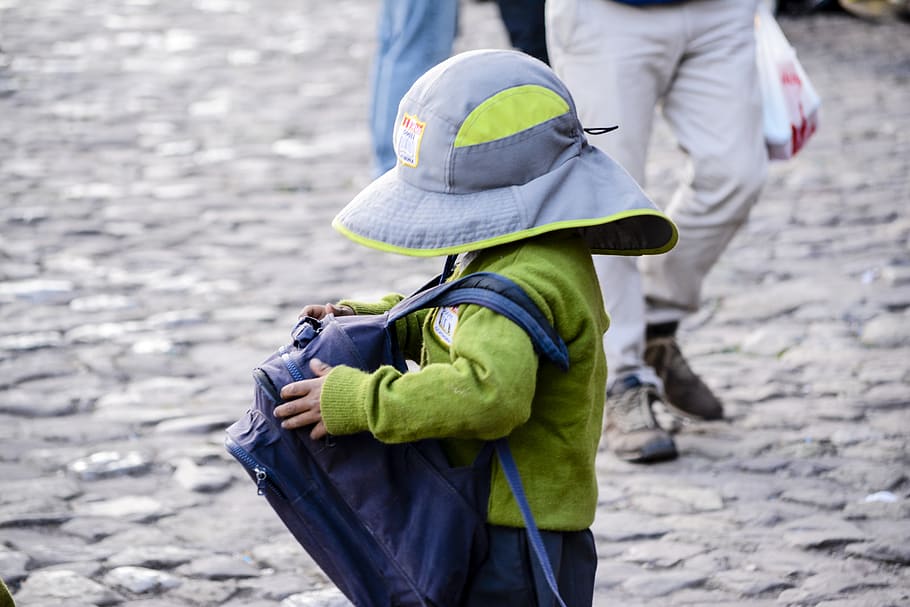toddler carrying blue backpack, hat, person, human, apparel, clothing HD wallpaper