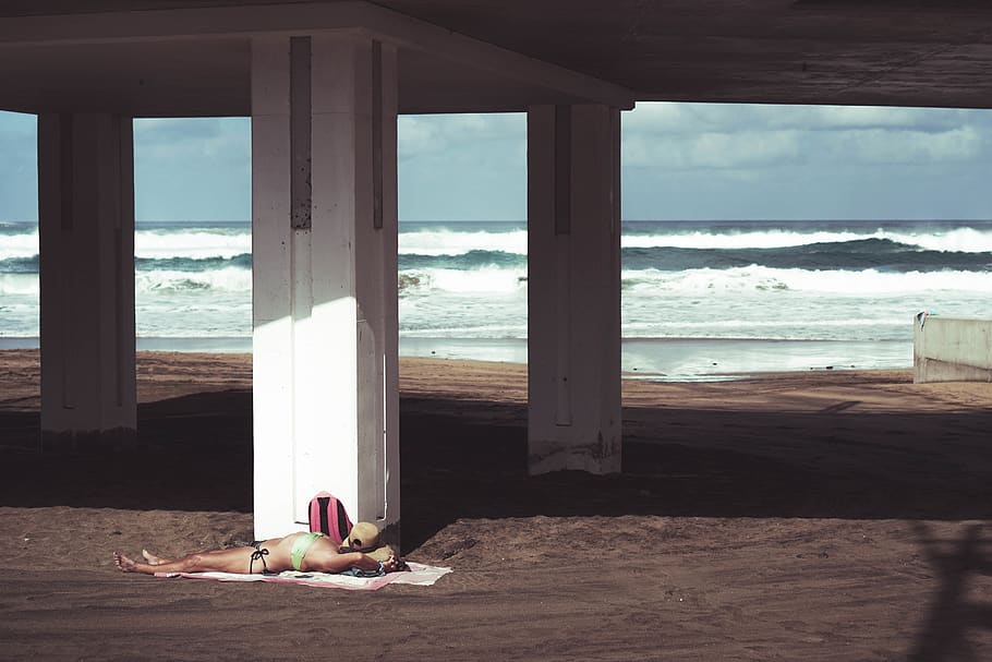 woman lying under bridge, sea, water, ocean, nature, outdoors HD wallpaper