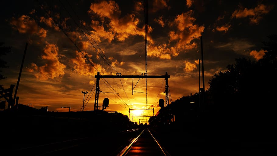 Train Railways Under Orange Skies, backlit, clouds, dark, dawn HD wallpaper