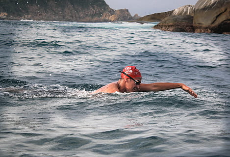 man swimming during daytime, clothing, apparel, human, person HD wallpaper