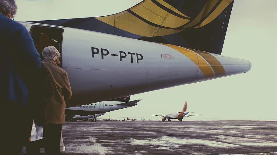 white and yellow plane, person, human, people, airplane, airport HD wallpaper