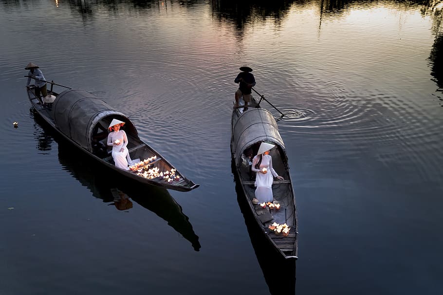 Four Person Using Two Boats on Calm Sea, action, ao dai, boatman
