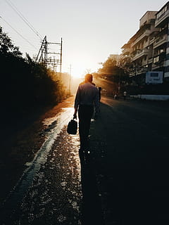 Man Walking on the Street, bright, building, commute, dawn, environment HD wallpaper