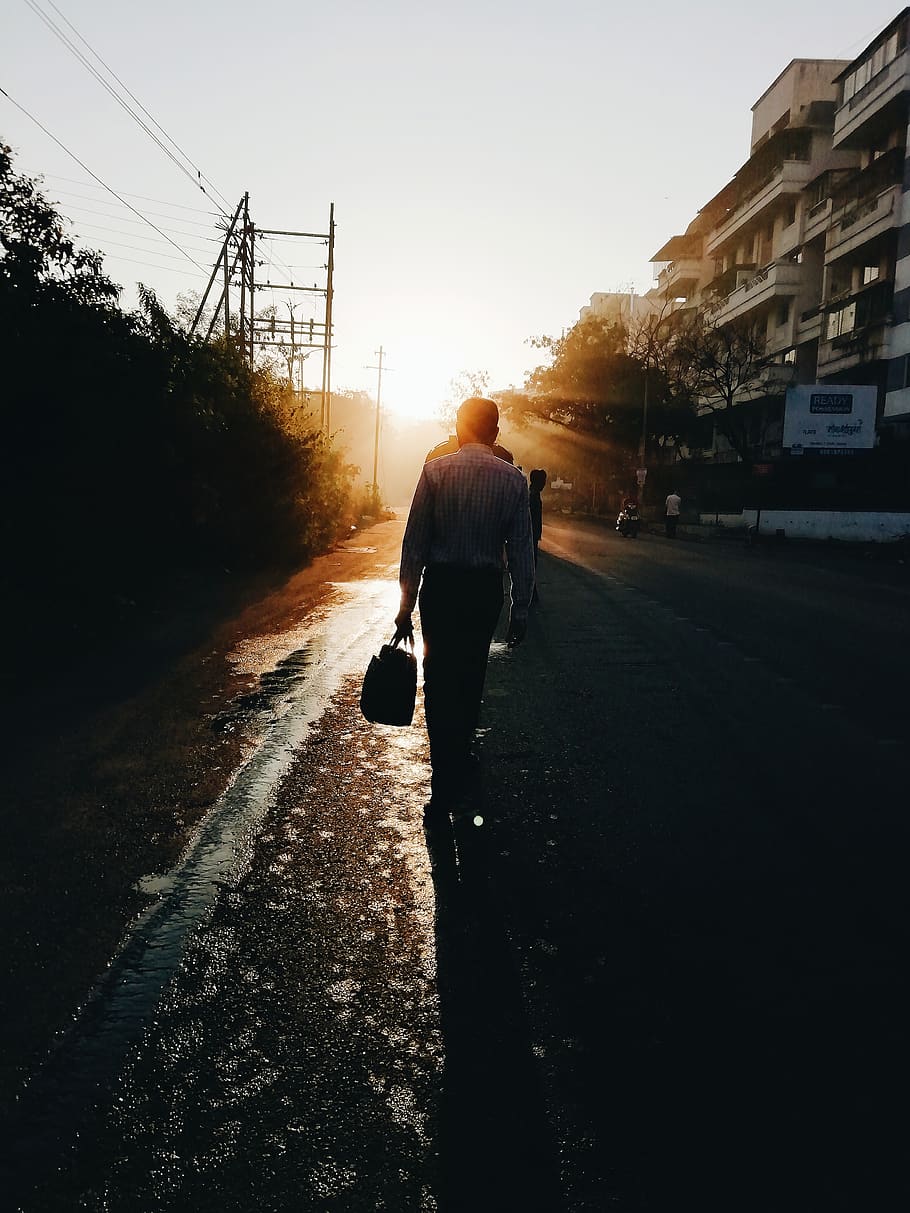 Man Walking on the Street, bright, building, commute, dawn, environment HD wallpaper