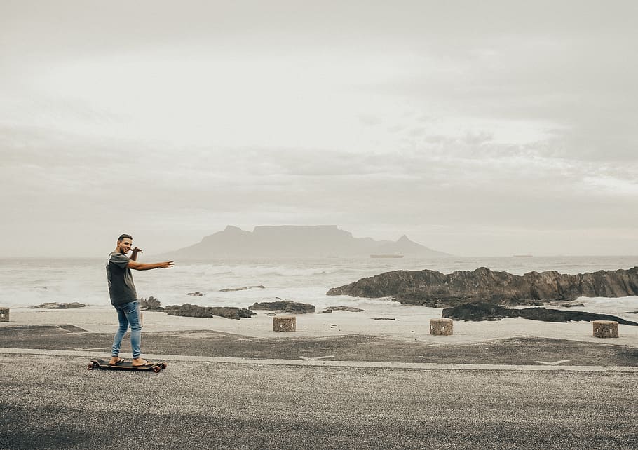 man riding on longboard, person, human, clothing, apparel, pants HD wallpaper