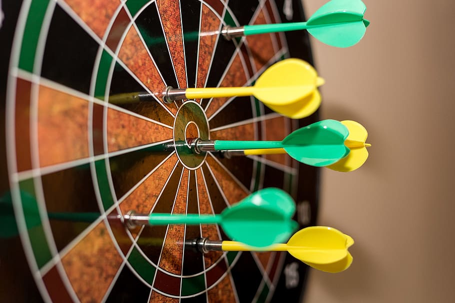 HD wallpaper: Green and Yellow Darts on Brown-black-green-and-red Dartboard - Wallpaper Flare